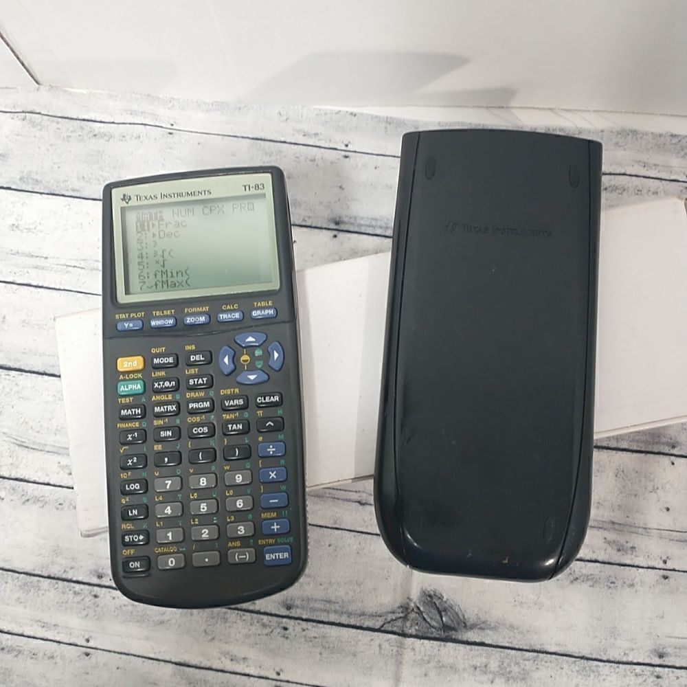 Texas Instruments TI-83  Graphing Calculator with Cover  Needs 4 AAA Batteries